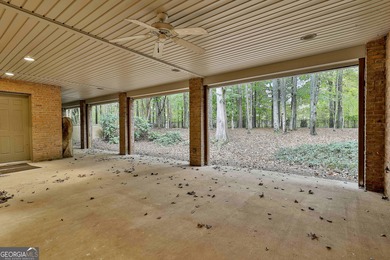 Don't miss this custom built all brick home with a 4 car garage on Whitewater Creek in Georgia - for sale on GolfHomes.com, golf home, golf lot