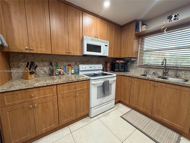 Spectacular 2/2 Condo with lots of amenities and completely on Sunrise Lakes Phase IV Golf Course in Florida - for sale on GolfHomes.com, golf home, golf lot