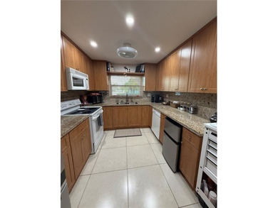 Spectacular 2/2 Condo with lots of amenities and completely on Sunrise Lakes Phase IV Golf Course in Florida - for sale on GolfHomes.com, golf home, golf lot