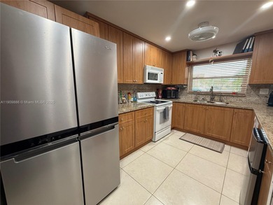 Spectacular 2/2 Condo with lots of amenities and completely on Sunrise Lakes Phase IV Golf Course in Florida - for sale on GolfHomes.com, golf home, golf lot