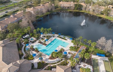 Stunning condo with pond view in 24 hours guard gated Bella Trae on ChampionsGate Golf Resort in Florida - for sale on GolfHomes.com, golf home, golf lot