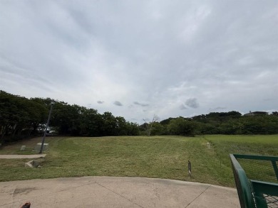A beautiful, gentle slope with mature trees, providing both on Tangle Ridge Golf Club in Texas - for sale on GolfHomes.com, golf home, golf lot