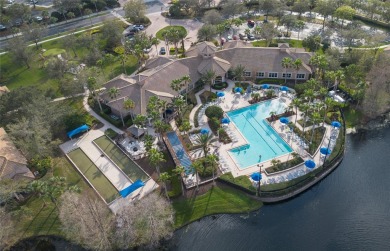 Stunning condo with pond view in 24 hours guard gated Bella Trae on ChampionsGate Golf Resort in Florida - for sale on GolfHomes.com, golf home, golf lot