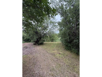 A beautiful, gentle slope with mature trees, providing both on Tangle Ridge Golf Club in Texas - for sale on GolfHomes.com, golf home, golf lot