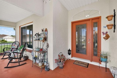 Step into easy Florida living with this well-maintained Squire on Monarch At Royal Highlands in Florida - for sale on GolfHomes.com, golf home, golf lot