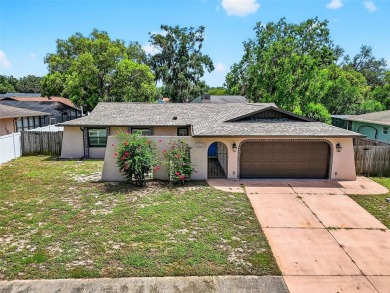This beautifully maintained home has had all the big-ticket on Meadow Oaks Golf and Country Club in Florida - for sale on GolfHomes.com, golf home, golf lot