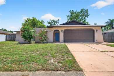 This beautifully maintained home has had all the big-ticket on Meadow Oaks Golf and Country Club in Florida - for sale on GolfHomes.com, golf home, golf lot