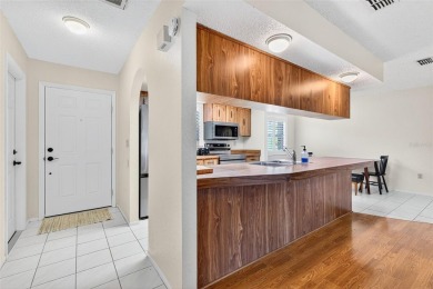 This beautifully maintained home has had all the big-ticket on Meadow Oaks Golf and Country Club in Florida - for sale on GolfHomes.com, golf home, golf lot