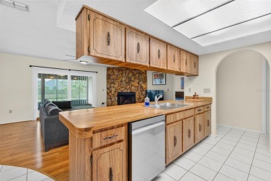 This beautifully maintained home has had all the big-ticket on Meadow Oaks Golf and Country Club in Florida - for sale on GolfHomes.com, golf home, golf lot