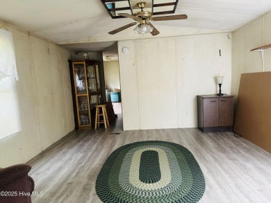 Affordable 3BDR/2BA single-wide manufactured home on one acre on Rivers Edge Golf Club in North Carolina - for sale on GolfHomes.com, golf home, golf lot