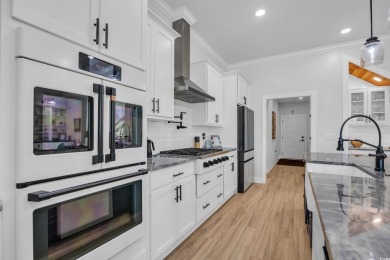 Welcome to the epitome of modern living in this impeccably on Wild Wing Plantation in South Carolina - for sale on GolfHomes.com, golf home, golf lot