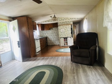 Affordable 3BDR/2BA single-wide manufactured home on one acre on Rivers Edge Golf Club in North Carolina - for sale on GolfHomes.com, golf home, golf lot