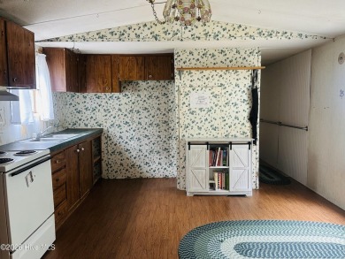 Affordable 3BDR/2BA single-wide manufactured home on one acre on Rivers Edge Golf Club in North Carolina - for sale on GolfHomes.com, golf home, golf lot