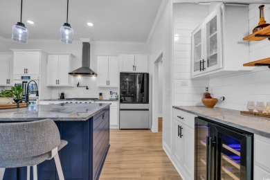 Welcome to the epitome of modern living in this impeccably on Wild Wing Plantation in South Carolina - for sale on GolfHomes.com, golf home, golf lot