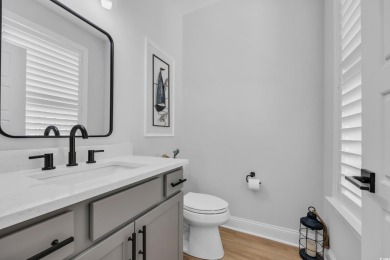 Welcome to the epitome of modern living in this impeccably on Wild Wing Plantation in South Carolina - for sale on GolfHomes.com, golf home, golf lot