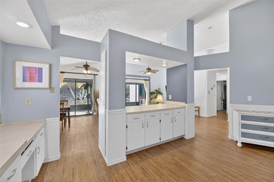 Step into this beautifully maintained 2-bedroom, 2-bath home on Sandpiper Golf Club in Florida - for sale on GolfHomes.com, golf home, golf lot