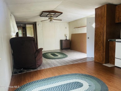 Affordable 3BDR/2BA single-wide manufactured home on one acre on Rivers Edge Golf Club in North Carolina - for sale on GolfHomes.com, golf home, golf lot