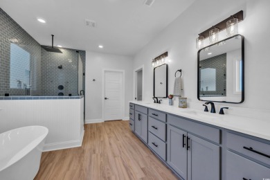 Welcome to the epitome of modern living in this impeccably on Wild Wing Plantation in South Carolina - for sale on GolfHomes.com, golf home, golf lot