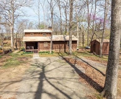 This comfortable cabin is located in a prime trout fishing area on  in Arkansas - for sale on GolfHomes.com, golf home, golf lot