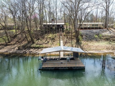 This comfortable cabin is located in a prime trout fishing area on  in Arkansas - for sale on GolfHomes.com, golf home, golf lot