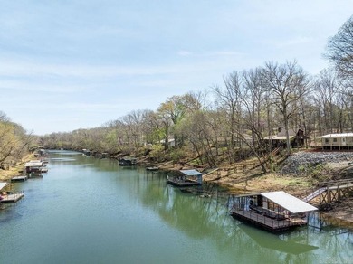 This comfortable cabin is located in a prime trout fishing area on  in Arkansas - for sale on GolfHomes.com, golf home, golf lot