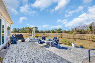 Welcome to the epitome of modern living in this impeccably on Wild Wing Plantation in South Carolina - for sale on GolfHomes.com, golf home, golf lot