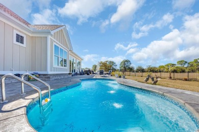 Welcome to the epitome of modern living in this impeccably on Wild Wing Plantation in South Carolina - for sale on GolfHomes.com, golf home, golf lot