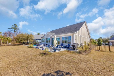 Welcome to the epitome of modern living in this impeccably on Wild Wing Plantation in South Carolina - for sale on GolfHomes.com, golf home, golf lot