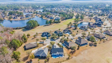 Welcome to the epitome of modern living in this impeccably on Wild Wing Plantation in South Carolina - for sale on GolfHomes.com, golf home, golf lot