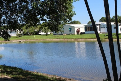 This beautiful 3 bedroom 2 bath home is located in one of the on Sabal Springs Golf and Racquet Club in Florida - for sale on GolfHomes.com, golf home, golf lot
