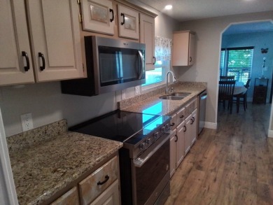 This beautiful 3 bedroom 2 bath home is located in one of the on Sabal Springs Golf and Racquet Club in Florida - for sale on GolfHomes.com, golf home, golf lot