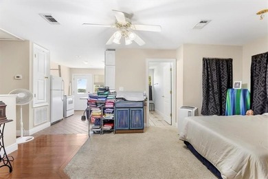 Stunning Waterfront Retreat in Gulf Hills - Ocean Springs on Gulf Hills Golf Club in MS - for sale on GolfHomes.com, golf home, golf lot