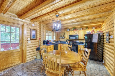 Welcome to this beautifully cared-for 2BR/2BA cabin tucked on Bent Creek Golf Course in Tennessee - for sale on GolfHomes.com, golf home, golf lot