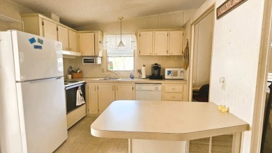 Welcome to your cozy retreat in the sought-after Golf Course on Blue Heron Pines Golf Course in Florida - for sale on GolfHomes.com, golf home, golf lot