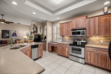 Welcome to this Entertainer's Dream Property overlooking the on Ocala Palms Golf and Country Club in Florida - for sale on GolfHomes.com, golf home, golf lot