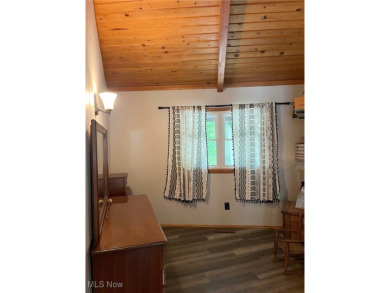 Here is a unique opportunity to own one of the original *round on Lake Mohawk Golf Club in Ohio - for sale on GolfHomes.com, golf home, golf lot