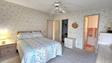Welcome to your cozy retreat in the sought-after Golf Course on Blue Heron Pines Golf Course in Florida - for sale on GolfHomes.com, golf home, golf lot