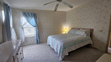 Welcome to your cozy retreat in the sought-after Golf Course on Blue Heron Pines Golf Course in Florida - for sale on GolfHomes.com, golf home, golf lot