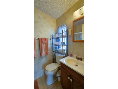 Welcome to your cozy retreat in the sought-after Golf Course on Blue Heron Pines Golf Course in Florida - for sale on GolfHomes.com, golf home, golf lot