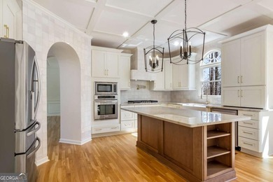 Welcome to this beautifully updated 5-bedroom, 3.5-bath home in on Towne Lake Hills Golf Club in Georgia - for sale on GolfHomes.com, golf home, golf lot