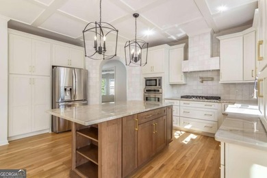 Welcome to this beautifully updated 5-bedroom, 3.5-bath home in on Towne Lake Hills Golf Club in Georgia - for sale on GolfHomes.com, golf home, golf lot