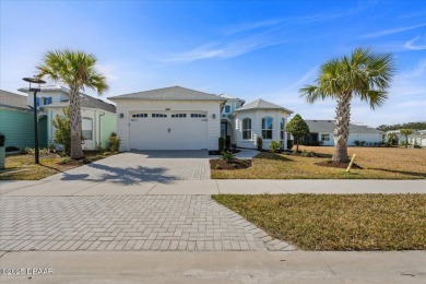 BEING SOLD PARTIALLY FURNISHED! This stunning Parrot model home on LPGA International Golf Course in Florida - for sale on GolfHomes.com, golf home, golf lot