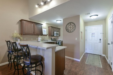 Step into modern comfort and timeless style in this beautifully on Pointe Royale Village Country Club in Missouri - for sale on GolfHomes.com, golf home, golf lot