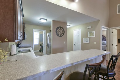 Step into modern comfort and timeless style in this beautifully on Pointe Royale Village Country Club in Missouri - for sale on GolfHomes.com, golf home, golf lot