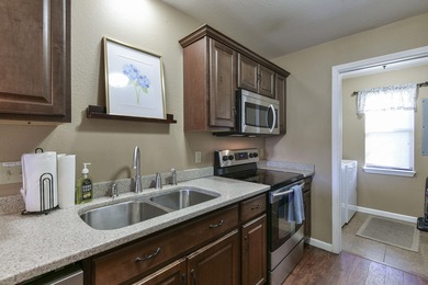 Step into modern comfort and timeless style in this beautifully on Pointe Royale Village Country Club in Missouri - for sale on GolfHomes.com, golf home, golf lot