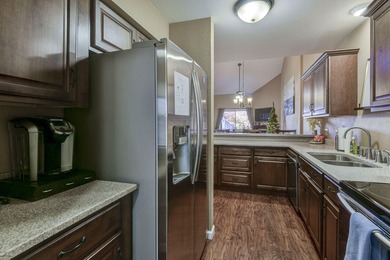 Step into modern comfort and timeless style in this beautifully on Pointe Royale Village Country Club in Missouri - for sale on GolfHomes.com, golf home, golf lot