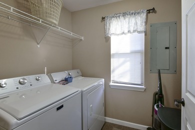 Step into modern comfort and timeless style in this beautifully on Pointe Royale Village Country Club in Missouri - for sale on GolfHomes.com, golf home, golf lot