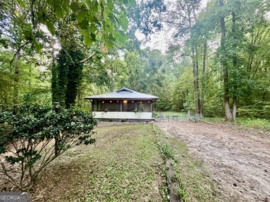 Cottage in the woods located in Turtle Cove! This ranch home on Turtle Cove Golf Course in Georgia - for sale on GolfHomes.com, golf home, golf lot