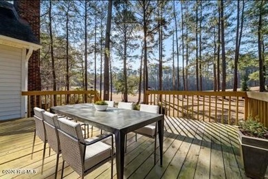 Experience modern living in this contemporary split-level home on Deercroft Golf and Country Club in North Carolina - for sale on GolfHomes.com, golf home, golf lot
