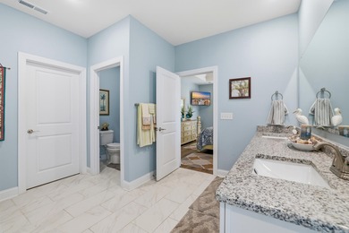 Experience the ease of coastal living in this impeccably on Surf Golf and Beach Club in South Carolina - for sale on GolfHomes.com, golf home, golf lot